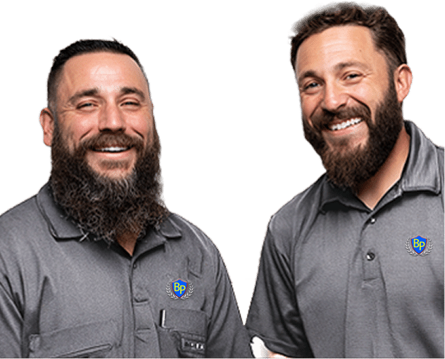 Burke Plumbing & Heating team members smiling and ready to provide professional plumbing and HVAC services